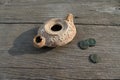 Clay Lamp with Roman Coins