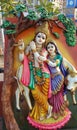 Clay made lord Krishna with a flute in hand and Radha and cow or dhenu under the tree, signifying love as venerated hindu culture