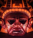 Clay mask of a maya in the dark