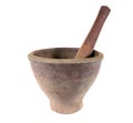 Clay mortar with wooden pestle inside isolated on white background. Clay mortar Royalty Free Stock Photo