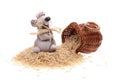 The clay mouse with a basket of rice