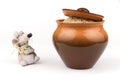 Clay mouse and pot with rice