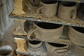 clay mugs in kiln for firing pottery Royalty Free Stock Photo