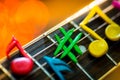 Clay notes on strings of guitar Royalty Free Stock Photo