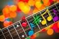 Clay notes on strings of guitar Royalty Free Stock Photo