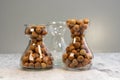 Clay pebbles for hydroponic gardening in a transparent glass vase