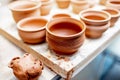 Clay pitchers at the pottery Royalty Free Stock Photo