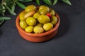 Clay pot with artisan olives. Royalty Free Stock Photo