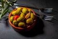 Clay pot with artisan olives. Royalty Free Stock Photo