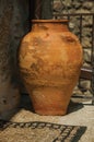 Clay pot in front of iron railing