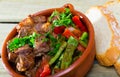 Clay pot with juicy pieces of stew meat