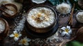 Clay pot with Kiribath on a rustic table, surrounded by coconut milk, rice, and frangipani flowers for Sinhalese New