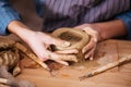 Clay pot making by hands of woman in pottery workshop Royalty Free Stock Photo