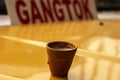 A clay pot of tea placed on bonnet of a car going to Gangtok, Sikkim