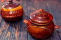 Clay pots on a wooden desk Royalty Free Stock Photo