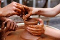 Clay potter hands wheel pottery work