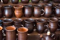 Clay pottery ceramic Products dry on shelf in workshop Royalty Free Stock Photo