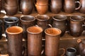 Clay pottery ceramic Products dry on shelf in workshop Royalty Free Stock Photo
