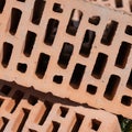 Clay red brick close-uo macro texture. Construction brick isolate on white Royalty Free Stock Photo