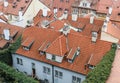 Clay roof tile roof tops of Prague buildings. Royalty Free Stock Photo