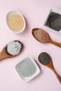 Clay is in a spoon on the pink background. Loose substances in a spoon on the pink background