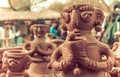 Clay statue of woman in surajkund fair, vintage style