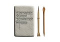 Clay tablet featuring cuneiform script, surrounded by two stylized writing tools. The Royalty Free Stock Photo