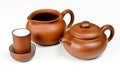Clay tea pot with accessories Royalty Free Stock Photo