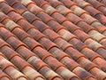 Clay (terracotta) tiles on the roof of a country house Royalty Free Stock Photo