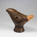 Clay toy whistle in the form of a bird.