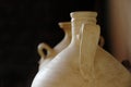 Clay water jug and pitcher botijos in Andalusia, Spain. Travel background with empty copy space