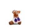 Clay whistle folk toy in the shape of a ram with mural isolated on a white background
