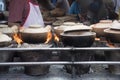 Claypot meal preparation using charcoal fire