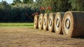 A clean archery range with a bow, arrows, and hay bale targets Royalty Free Stock Photo