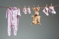 Clean baby girl clothes on the clothesline Royalty Free Stock Photo