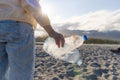 Clean beach concept volunteer pick up trash at beach