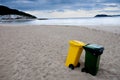 Clean beach and recycling bins.