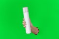 Clean Bottle Spray Flacon in the Hand. Cosmetic or Perfume Advertisement. Ready to use Item for Branding. Photo for