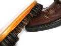 Clean brush and brown men shoes Royalty Free Stock Photo