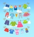 Clean child kids small clothes, cloth rope for white clouds Royalty Free Stock Photo