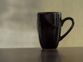 Clean clack coffee mug cup on table vintage tone Royalty Free Stock Photo