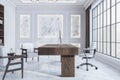 Clean classic office interior with wooden furniture and marble walls, window with city view and sunlight.