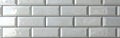 Clean and Classic: White Brick Subway Tile Wall Texture - Seamless Panoramic Background for Wide Banners Royalty Free Stock Photo