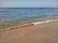 Clean clear beach sand in and calms sea wave , Muscat, Oman