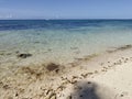 Clean and Clear Seawater with a Blue Sky Royalty Free Stock Photo