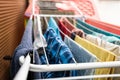 Clean clothes are dried after washing by hanging on clotheslines, on a special dryer, indoors. Royalty Free Stock Photo