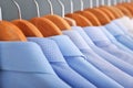 Clean clothes on hangers after dry-cleaning Royalty Free Stock Photo