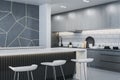 Clean concrete and marble kitchen interior with island and stools. Luxury apartments concept.