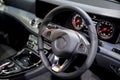 Clean console modern car interior black steering wheel Royalty Free Stock Photo