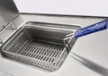 Clean deep fryer close up photo in kitchen hi Royalty Free Stock Photo